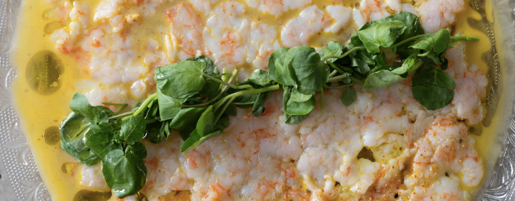 Carpaccio de Camarones con Dressing de Maracuyá