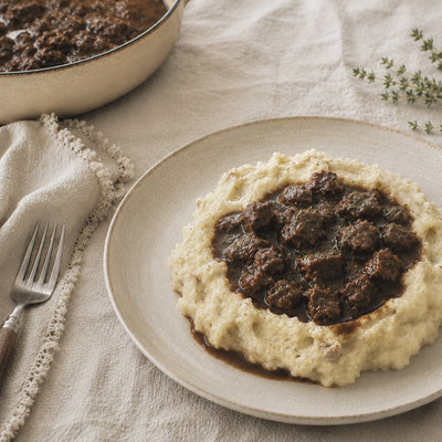 Boeuf Bourguignon con Puré Rústico
